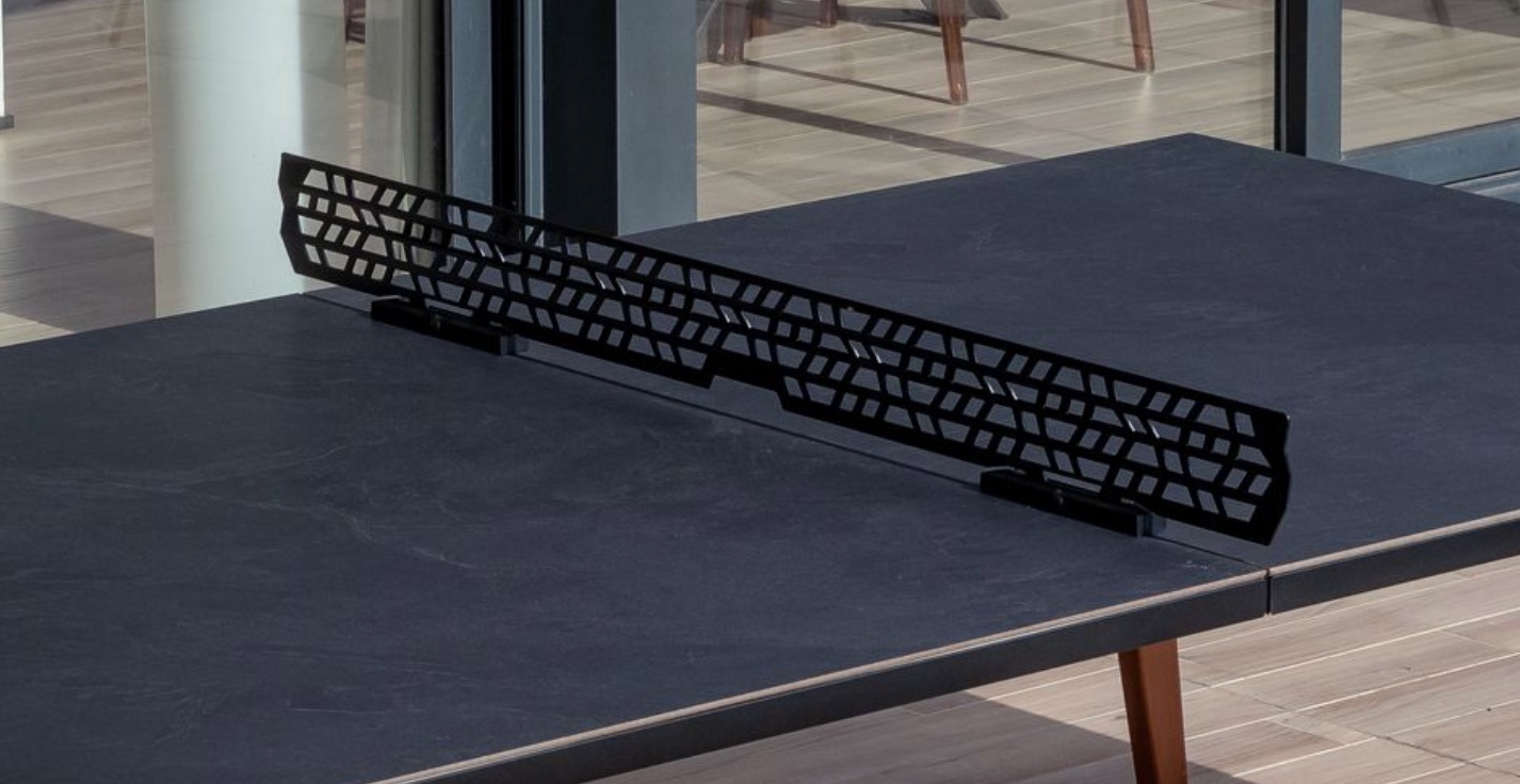 Cornilleau magnetic steel net on an Origin table